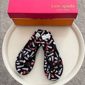 NIB Kate Spade Black Sandals with Lipstick Design flip flop